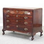 An early 20th century serpentine chest,