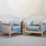 A pair of gilt framed pale blue upholstered armchairs,