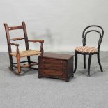 A 19th century elm rush seated child's rocking chair,