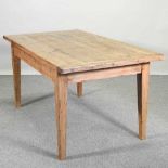 A large modern pine dining table,