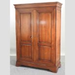 A modern cherrywood double wardrobe,