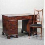 A late Victorian mahogany pedestal desk,