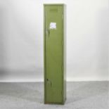 A green painted metal gun cabinet,