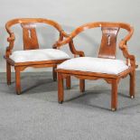 A pair of late 20th century Chinese hardwood armchairs