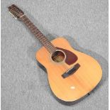 A Yamaha twelve string acoustic guitar,