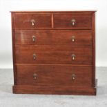 An early 20th century oak chest of drawers,