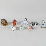 A collection of eight Royal Crown Derby paperweights,