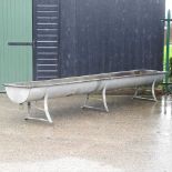 A galvanised feed trough,