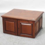 An early 20th century mahogany table top cabinet,