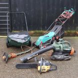 A large collection of garden tools,