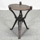 An African carved hardwood occasional table,