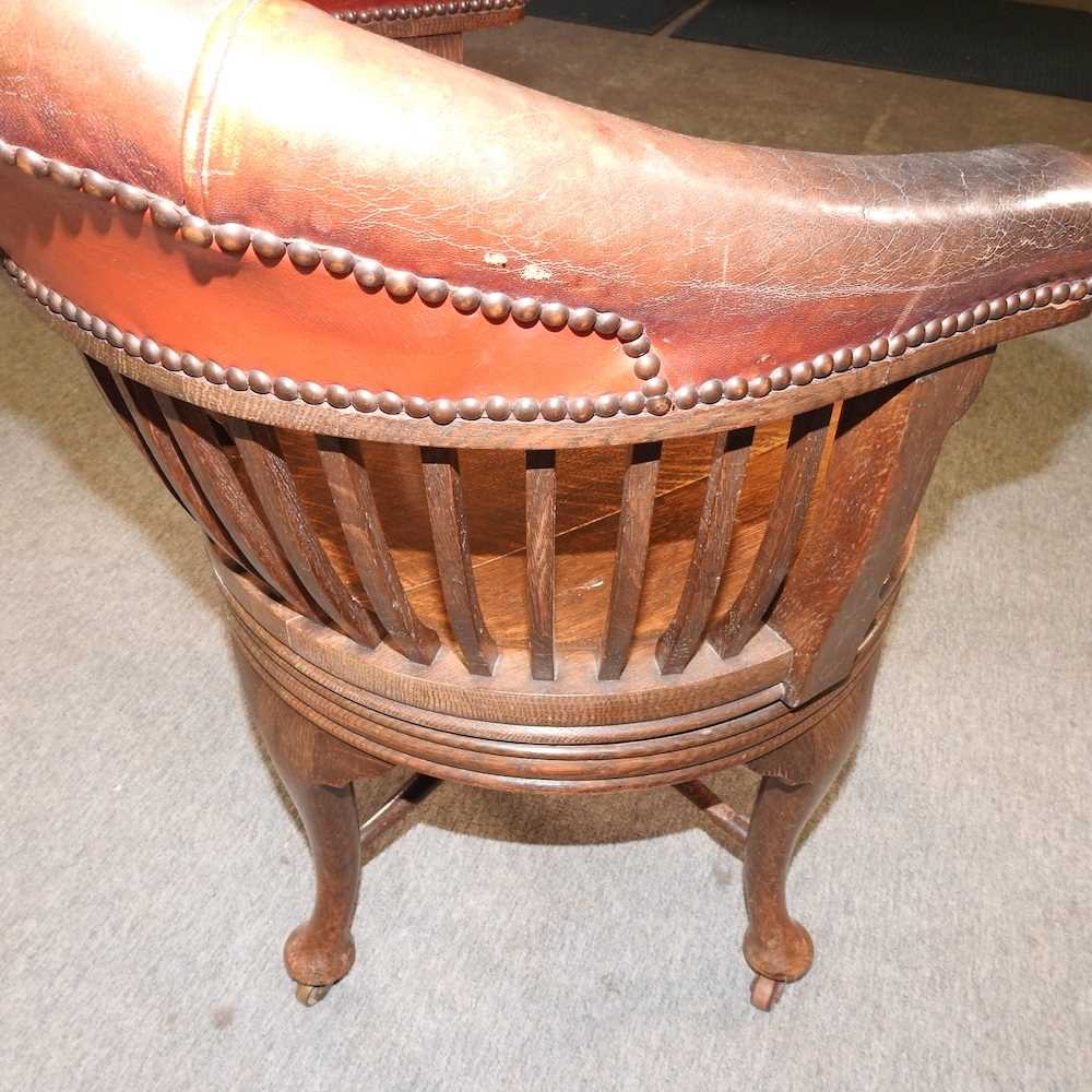 A late Victorian oak and leather upholstered swivel desk chair, - Image 6 of 6