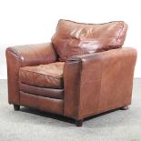 A modern brown leather armchair