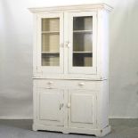 An early 20th century and later cream painted dresser,