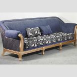 A large modern gilt and blue upholstered sofa,