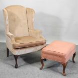 A wing armchair,