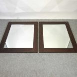 A pair of modern wooden framed wall mirrors,