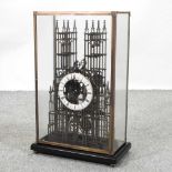 A brass cathedral skeleton clock,