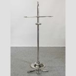 A modern metal valet stand,