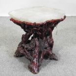 An Eastern root wood and rock crystal occasional table,