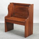 A hand made mahogany window settle,