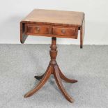 A reproduction yew wood occasional table