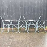 Two pairs of metal garden bench ends,