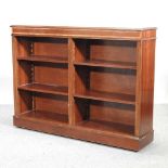 An Edwardian mahogany and crossbanded dwarf open bookcase,