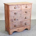 A Victorian stripped pine chest