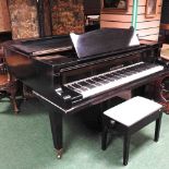 An early 20th century German August Forster baby grand piano,