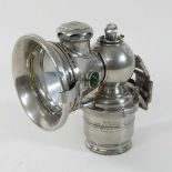 An early 20th century Joseph Lucas nickel cased bicycle lamp,