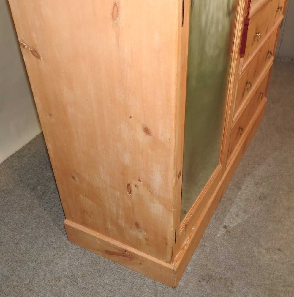 An Edwardian stripped pine combination wardrobe, - Image 13 of 13