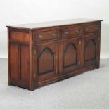 A 20th century oak sideboard,