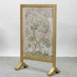 An early 20th century tapestry firescreen,