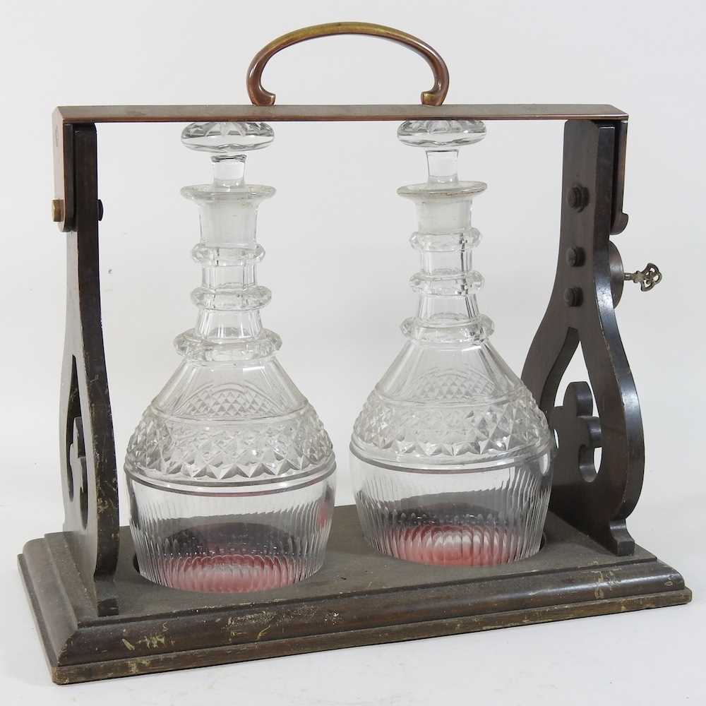 An early 20th century two bottle tantalus - Image 3 of 9