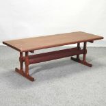 A 1970's teak coffee table,