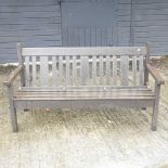 A teak garden bench,