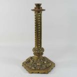 A large and ornate 19th century brass lamp base,