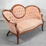 A Victorian style upholstered sofa,