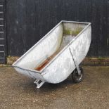 A galvanised water barrow,