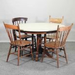 A pine and painted circular dining table,