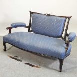 A Victorian blue upholstered sofa,