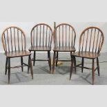 A set of four mid 20th century Ercol style spindle back dining chairs,