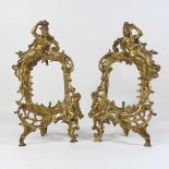 A pair of ornate 19th century cast gilt metal picture frames,