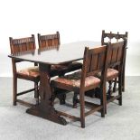 A 1970's Ercol dark elm dining suite,