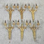 A set of six 19th century brass twin branch wall lights,