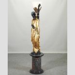 After Milo, Miguel Fernando Lopez, a bronze and gilt life size figural lamp,