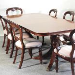 A reproduction mahogany dining suite,