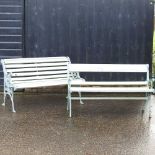 A cast iron and slatted wooden garden bench,
