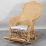 A 20th century wicker rocking chair